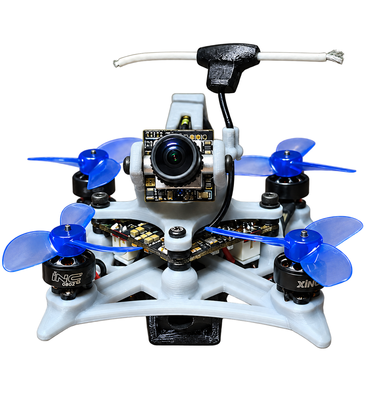 Compact custom FPV drone with camera, four motors, blue propellers, and printed frame